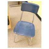 Rm 101A - shelves and contents and a chair