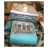 Custodian - Tennant 2550 floor scrubber with charger