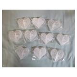 10 Selenite Crystal Hearts with Fairies on them. 10 Selenite Crystal Hearts with Fairies on them.