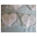 10 Selenite Crystal Hearts with Fairies on them. 10 Selenite Crystal Hearts with Fairies on them.