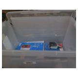 Covered totes containing 5 10 packs...