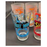 Simpsons 16oz Pint Glass Set - Assorted Characters (Homer, Moe, Batman, Superman) Simpsons 16oz Pint Glass Set - Assorted Characters (Homer, Moe, Batman, Superman)
