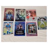 Lot of 7 Rookies and Inserts Football Cards Featuring Jahmyr Gibbs, Jaxon Smith-Njigba, Baker Mayfield, Trevor Lawrence, Deshaun Watson, and Jeremiah Trotter Jr. Lot of 7 Rookies and Inserts Football Cards Featuring Jahmyr Gibbs, Jaxon Smith-Njigba, Baker Mayfield, Trevor Lawrence, Deshaun Watson, and Jeremiah Trotter Jr.