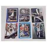 Lot of 6 Stephen Curry Basketball Cards Including Donruss Scoring Kings, Panini Dominance, and Mosaic Will to Win with Golden State Warriors Features Lot of 6 Stephen Curry Basketball Cards Including Donruss Scoring Kings, Panini Dominance, and Mosaic Will to Win with Golden State Warriors Features