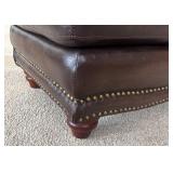 O - Brown Leather Ottoman with Nailhead Trim and Wooden Feet O - Brown Leather Ottoman with Nailhead Trim and Wooden Feet