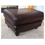 O - Brown Leather Ottoman with Nailhead Trim and Wooden Feet O - Brown Leather Ottoman with Nailhead Trim and Wooden Feet