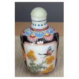 DR - Three Chinese Porcelain and Glass Snuff Bottles DR - Three Chinese Porcelain and Glass Snuff Bottles