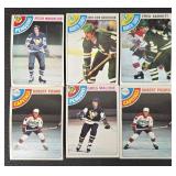 Vintage 1970s NHL Hockey Cards (Lot of 48) featuring Bruins, Sabres, North Stars, Penguins