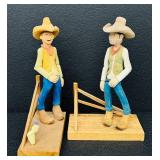 Pair of Hand-Carved Cowboy Figurines