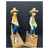 Pair of Hand-Carved Cowboy Figurines
