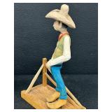 Pair of Hand-Carved Cowboy Figurines