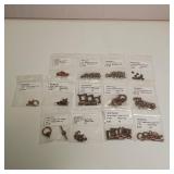 Lot of Antique copper alloy finings. 13 packages total.