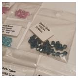 Lot of 14 packages real glass crystal beads