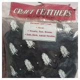 Lot of four packages craft feathers, All purpose fluffs, decorate and craft, florals, wreaths, fans, brooms, dolls, birds, animal novelties.