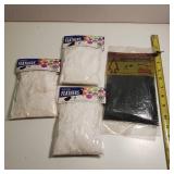 Lot of four packages craft all purpose fluffs, decorative and craft feathers.