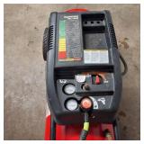 Husky Verti-Zontal 26-gallon air compressor with the model number WL650702AJ.