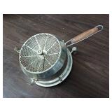 Vintage Foley food mill, commonly used for mashing and straining foods like applesauce or tomatoes