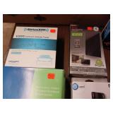 Large Lot  collection of electronic networking and media hardware, including several Slingbox devices, a digital-to-analog converter box, and various routers/modems