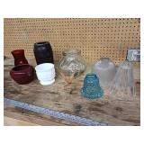 These vintage apothecary jars originally used in pharmacies to store and display medicines and chemicals