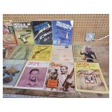 Collection of vintage firearms magazines and catalogs from the mid-20th century.