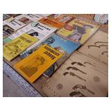 A collection of vintage Western Americana and firearms-related publications.
