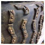 Set of used ATV tires mounted on gold-colored rims