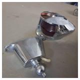 Lot of boat parts, primarily chrome accessories including spotlights, navigation lights, and a horn