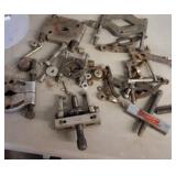 Large lot of vintage mechanical pullers, used for removing gears, bearings, or pulleys from shafts.