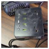 Milwaukee M18 & M12 Multi-Voltage Charger (Model 48-59-1812).  and other chargers plus a trail cam!