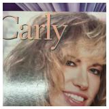 Large collection of vintage music vinyl records featuring artists like Laura Branigan and The Ink Spots