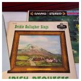 Large lot of vintage vinyl records featuring various artists and genres from the mid-20th century