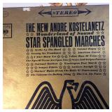 Large lot of vintage vinyl records featuring various artists and genres from the mid-20th century