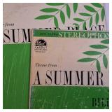 A collection of vintage vinyl records from various artists and genres.