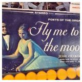 A collection of vintage vinyl records from various artists and genres.