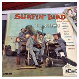 A collection of vintage vinyl records from various artists and genres.