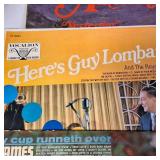 A  large collection of vintage vinyl records from artists like Johnny Mathis, Billy Vaughn, Ray Conniff, and Dean Martin