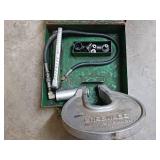 Greenlee 1731 hydraulic punch driver kit with a 767 hydraulic hand pump.