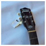 Vintage 1960s Harmony Stratotone electric guitar - highly collectible instrument.