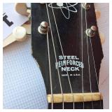 Vintage 1960s Harmony Stratotone electric guitar - highly collectible instrument.