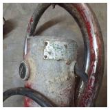 Hand-held electric concrete vibrator used to remove air bubbles and solidify concrete mixtures