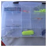Fishing tackle bag set Okeechobee Fats soft-sided tackle bag paired with clear plastic utility trays chock full of various fishing lures.