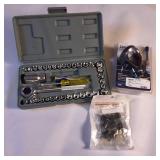 40-piece socket wrench and repair tool set accompanied by a grout removal tool and small fasteners.