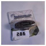 KnuKonceptz brand car audio accessory, specifically a surface-mounted component for wiring or lighting.