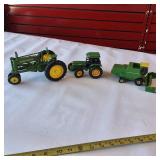 Collection of vintage John Deere harvesting equipment models, 1:64 scale set