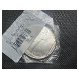 1995 Uncirculated American Silver Eagle in sealed Littleton package 1995 Uncirculated American Silver Eagle in sealed Littleton package