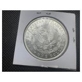 1881 Morgan Silver Dollar Marked BU MS65 Tone When Purchased 1881 Morgan Silver Dollar Marked BU MS65 Tone When Purchased