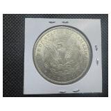 1900 Morgan Silver Dollar Marked AU When Purchased 1900 Morgan Silver Dollar Marked AU When Purchased