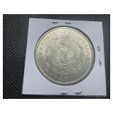 1900 Morgan Silver Dollar Marked AU When Purchased 1900 Morgan Silver Dollar Marked AU When Purchased