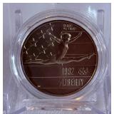 1992 P-Olympic Gymnastics Commemorative Clad Uncirculated Half Dollar - just the coin in a protective plastic case 1992 P-Olympic Gymnastics Commemorative Clad Uncirculated Half Dollar - just the coin in a protective plastic case