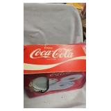 Coca Cola Dishes , and unopened tin with railroad toy on top Coca Cola Dishes , and unopened tin with railroad toy on top